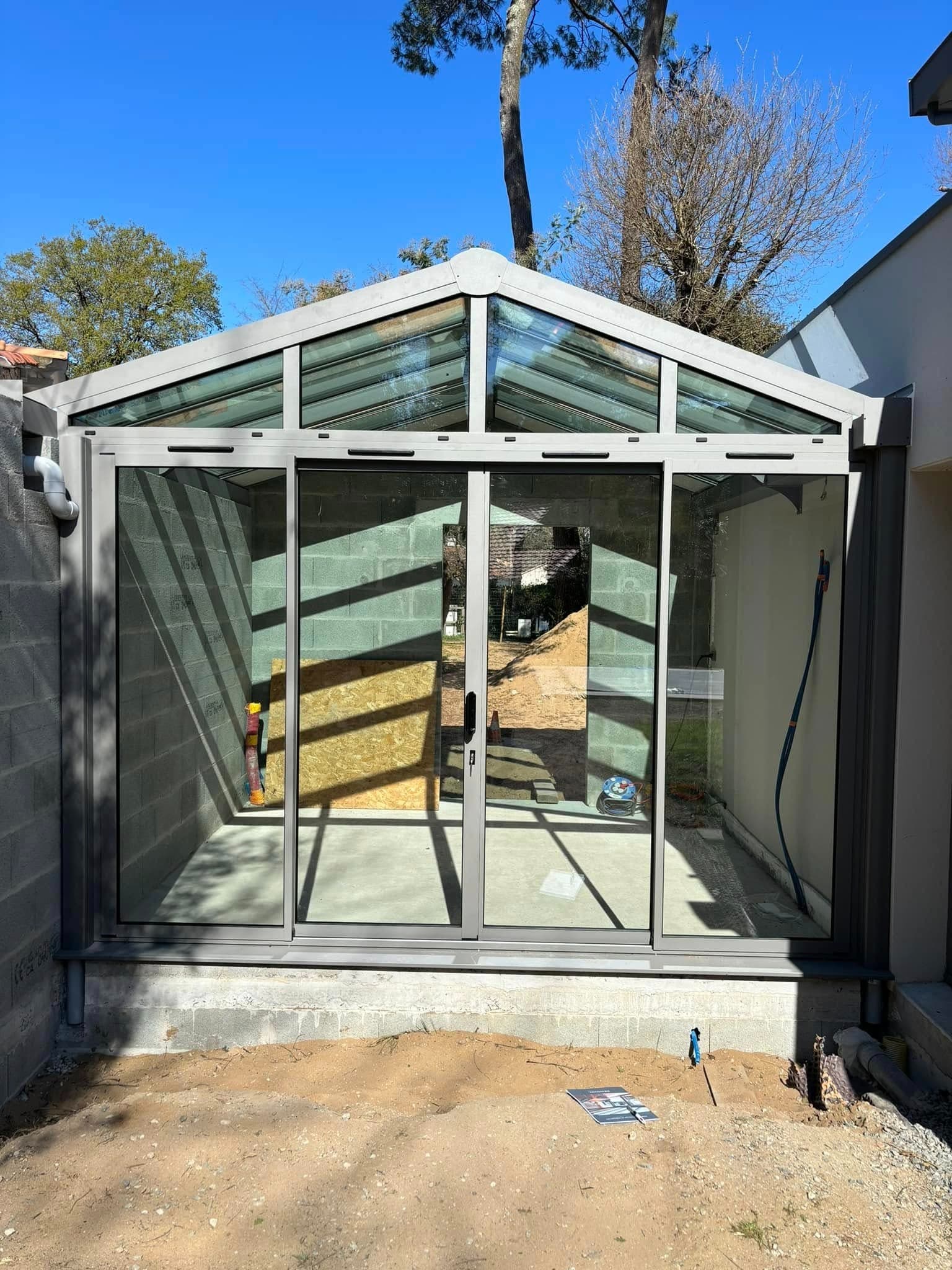 Verrière d'extension à toit double pente